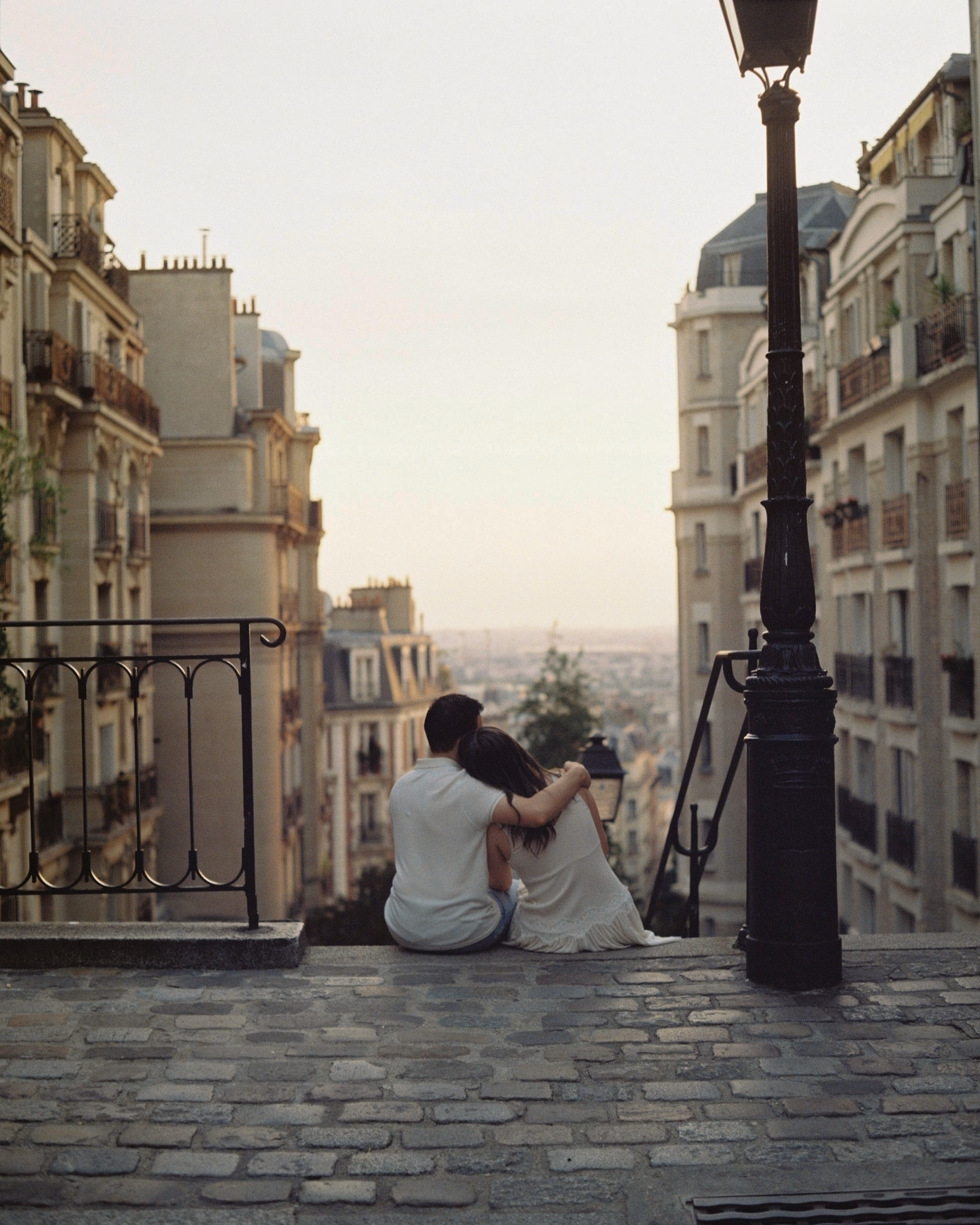 Couple portrait in Montmartre stairs, shot on color film, paris, engagement session, couple session, film photography